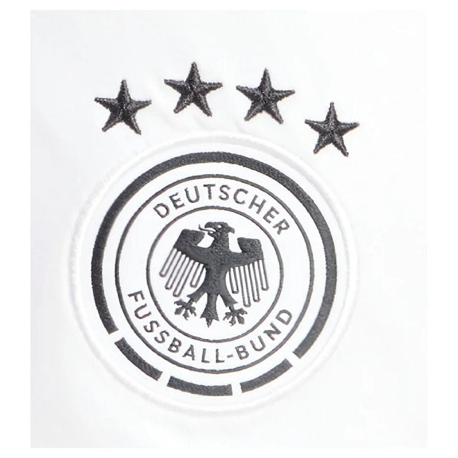 A black and white German football association patch featuring four stars above a circular emblem with an eagle and the text 'DEUTSCHER FUSSBALL-BUND'.