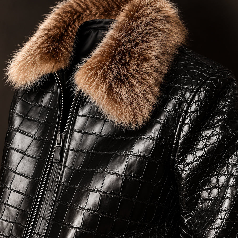 Close-up of a black textured leather jacket with a large brown fur collar, featuring a front zipper and a glossy crocodile-embossed pattern.