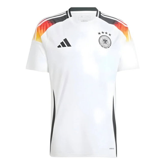 A white Adidas Germany soccer jersey with black shoulder stripes, a black Adidas logo, and a black Germany crest with four stars on the chest. The shoulders feature a red, orange, and yellow gradient accent.