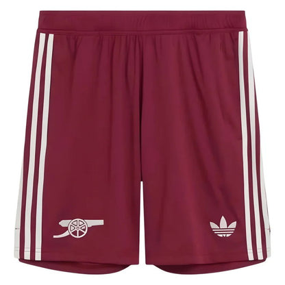 A pair of Adidas athletic shorts in maroon with white stripes down the sides and white embroidered logos on the lower legs, shown against a plain white background.