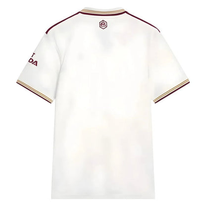 White short-sleeve soccer jersey shown from the back, featuring maroon shoulder stripes, striped collar, a small hexagonal crest at the back neck, and partial sleeve text on the left arm.