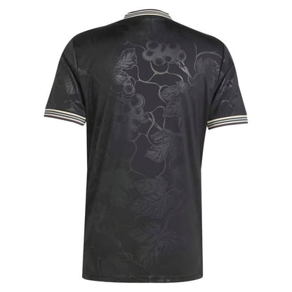 A black short-sleeve athletic jersey shown from the back, featuring a subtle dark gray floral vine pattern across the back and white stripes on the collar and sleeve cuffs.