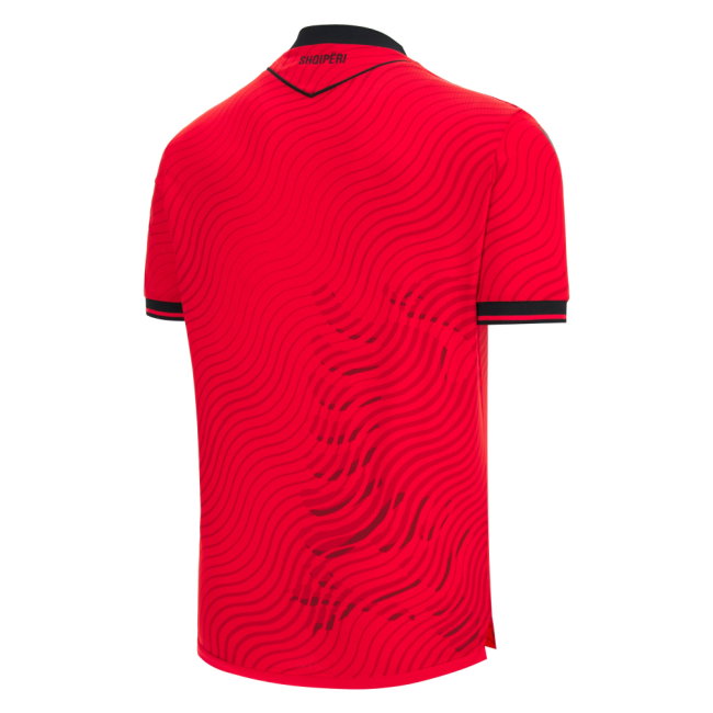 Red sports jersey with black pattern on a white background