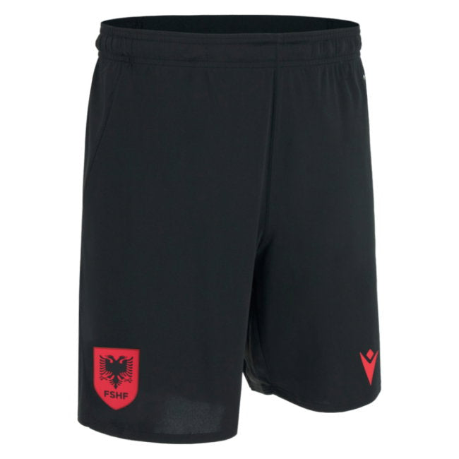 Black athletic shorts featuring a red shield crest with a black eagle and the text 'PSHF' on the lower left leg, and a red triangular logo on the lower right leg, shown against a plain white background.
