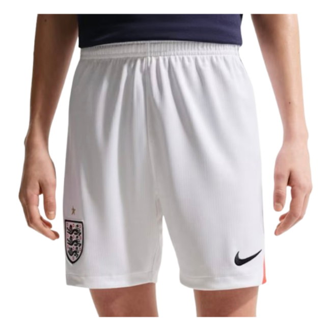 White Nike England soccer shorts worn by a model, featuring the England crest on the left leg and a black swoosh on the right leg.