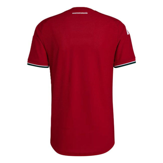 A red short-sleeve athletic jersey shown from the back, featuring a subtle textured pattern, white 'AEROFLOW' branding at the inner neck, and thin green and white striped trim on the sleeve cuffs.