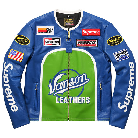 A blue and green Vanson Leathers racing jacket with Supreme branding, sponsor patches, and an American flag on the sleeve, shown flat against a white background.