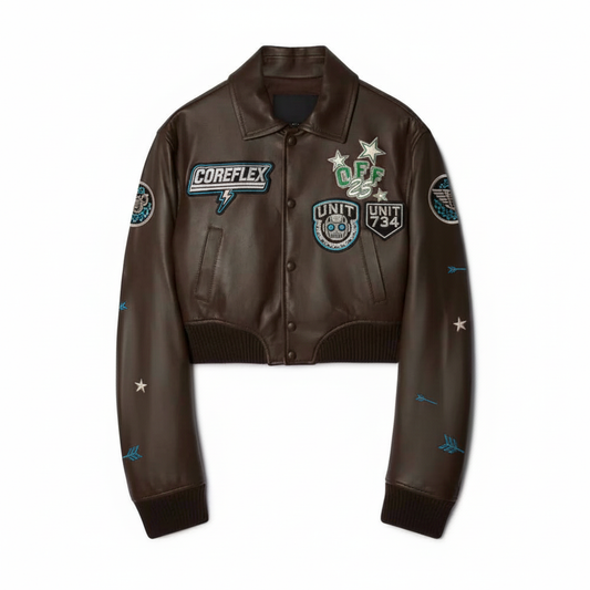 Brown leather jacket with various patches on a white background