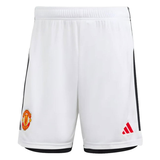 White Adidas Manchester United home soccer shorts with black side stripes, featuring the Manchester United crest on the left leg and the red Adidas logo on the right leg.