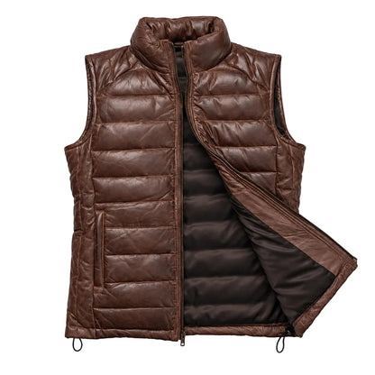 Shop our men's dark brown leather down vest made from full-grain lambskin with lightweight 80/20 down insulation, quilted panels, front pockets, and a padded collar.