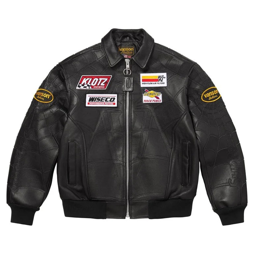 A black leather racing jacket with multiple sponsor patches including Klotz, Wiseco, and Vanscott, displayed on a clean white background.