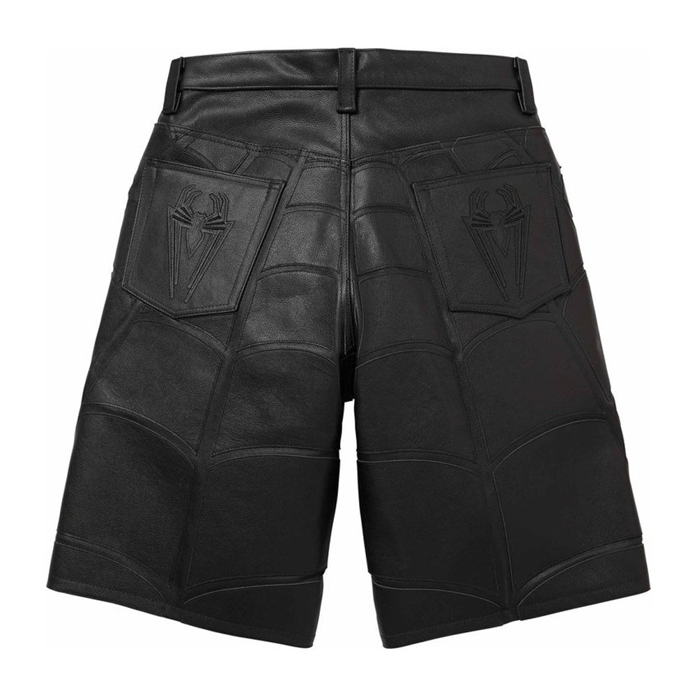 Black leather shorts with a high waist, featuring a quilted panel design and embossed spider logos on the back pockets, shown against a plain white background.