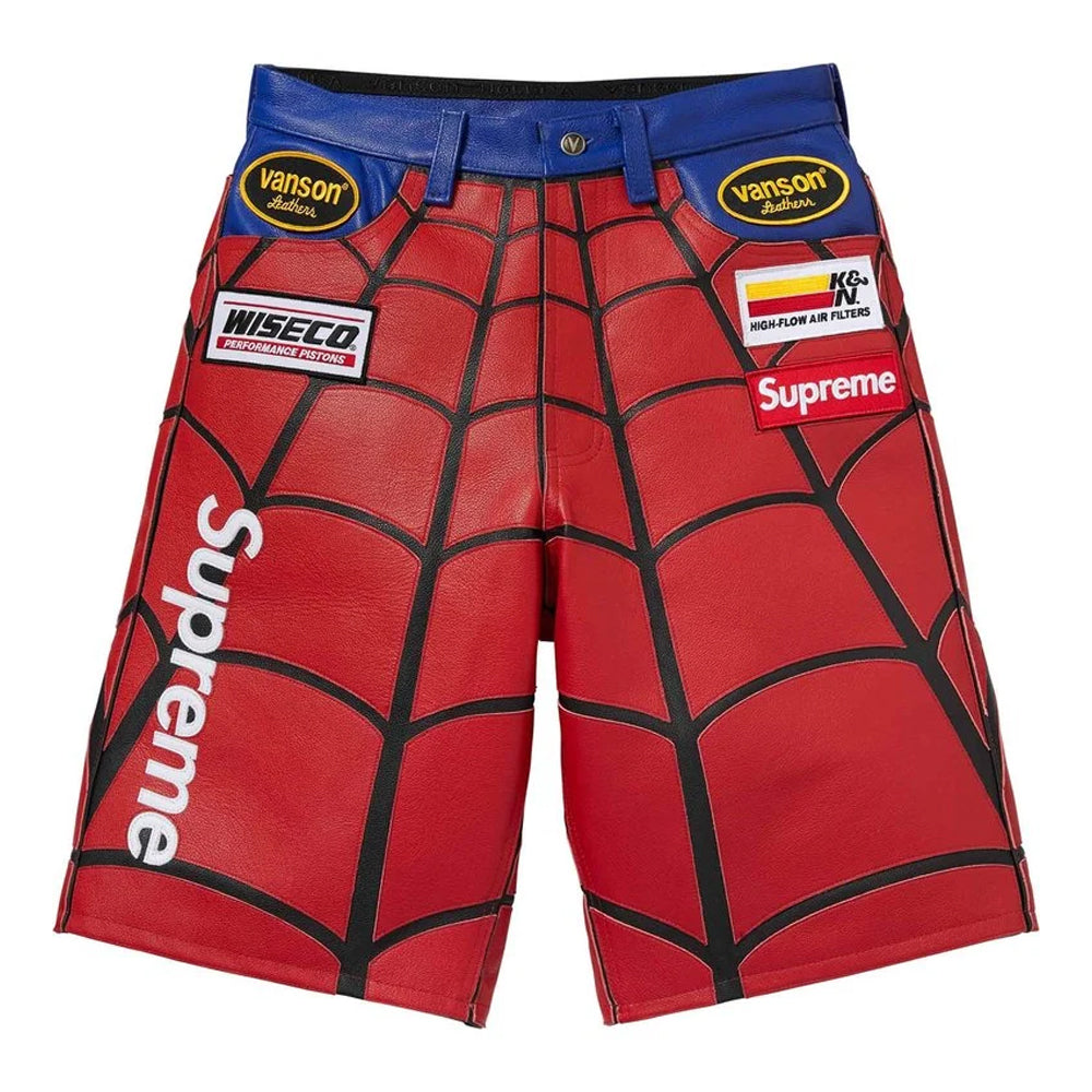 Red and black Spider-Man themed MMA shorts with Supreme and Wiseco sponsor patches, a blue waistband, and a white Supreme logo on the left leg.