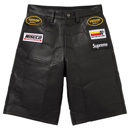 Black leather shorts featuring a textured, quilted pattern and multiple brand patches including Supreme, Vanson, and Wiseco.
